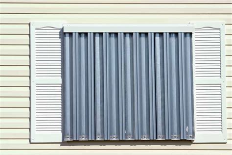 hurricane metal shutters vs fabric shield|fabric hurricane shutters home depot.